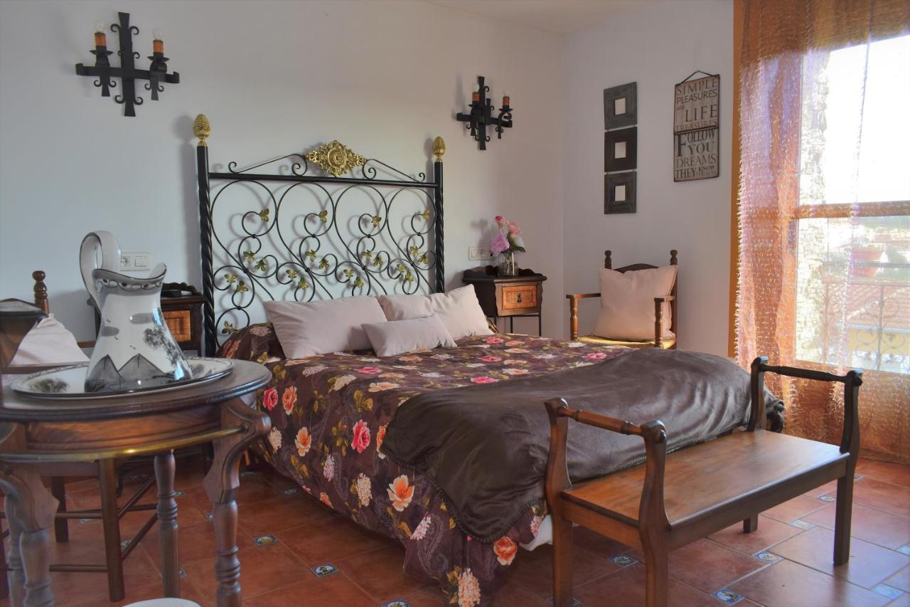 Posada El Arriero Torrejón el Rubio Esterno foto